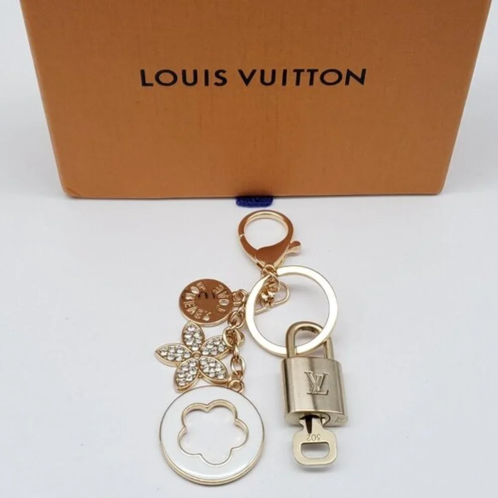 Authentic Louis Vuitton Gold Lock & Box w/ Unbranded Flower Bagcharm 120825